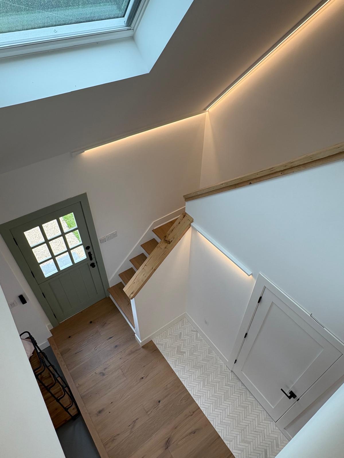 Entryway with staircase and LED lighting